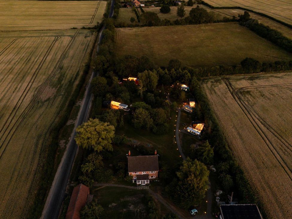 An aerial view of a property with a house and outdoor areas at Sleeps 2 - Hot Tub - Pet Friendly - PeggySue