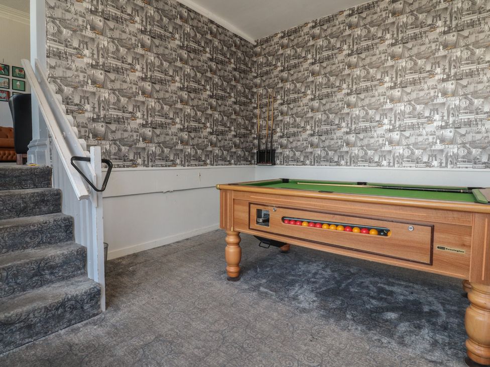 A game room with a pool table and stairs at Luxury Winter Gardens Apartment 1 in Blackpool