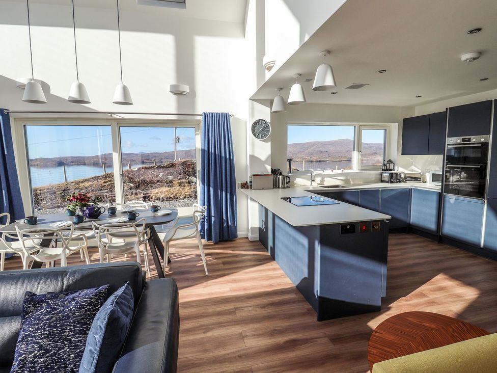 A kitchen with views of the outdoors at 8B Carrigreich, Isle of Harris
