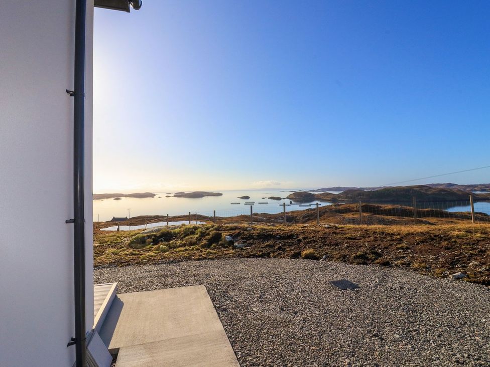 A view of islands and water from a property at 8B Carrigreich Isle of Harris