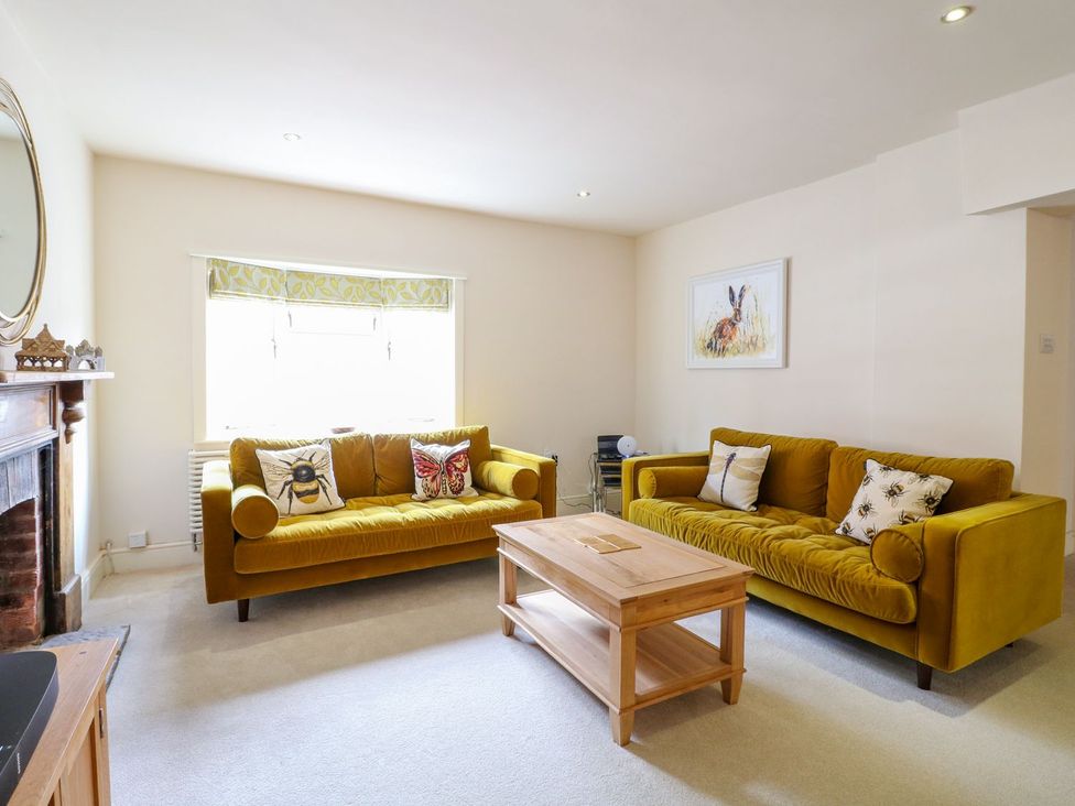 A living room with sofas and a coffee table at Lion House in Ashbourne