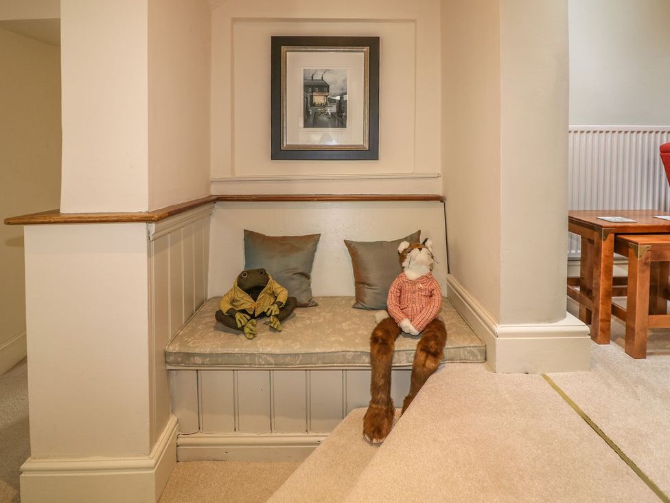 A nook with plush toys on a bench at Lion House in Ashbourne