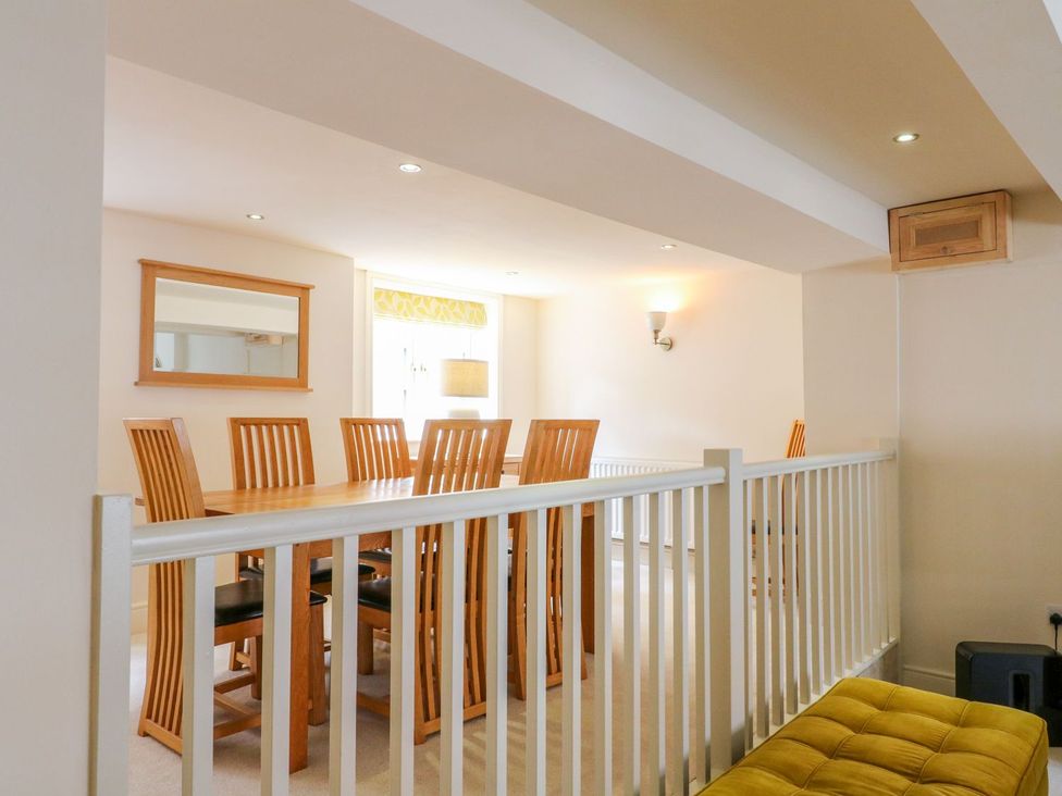 A dining room with a table and chairs at Lion House in Ashbourne