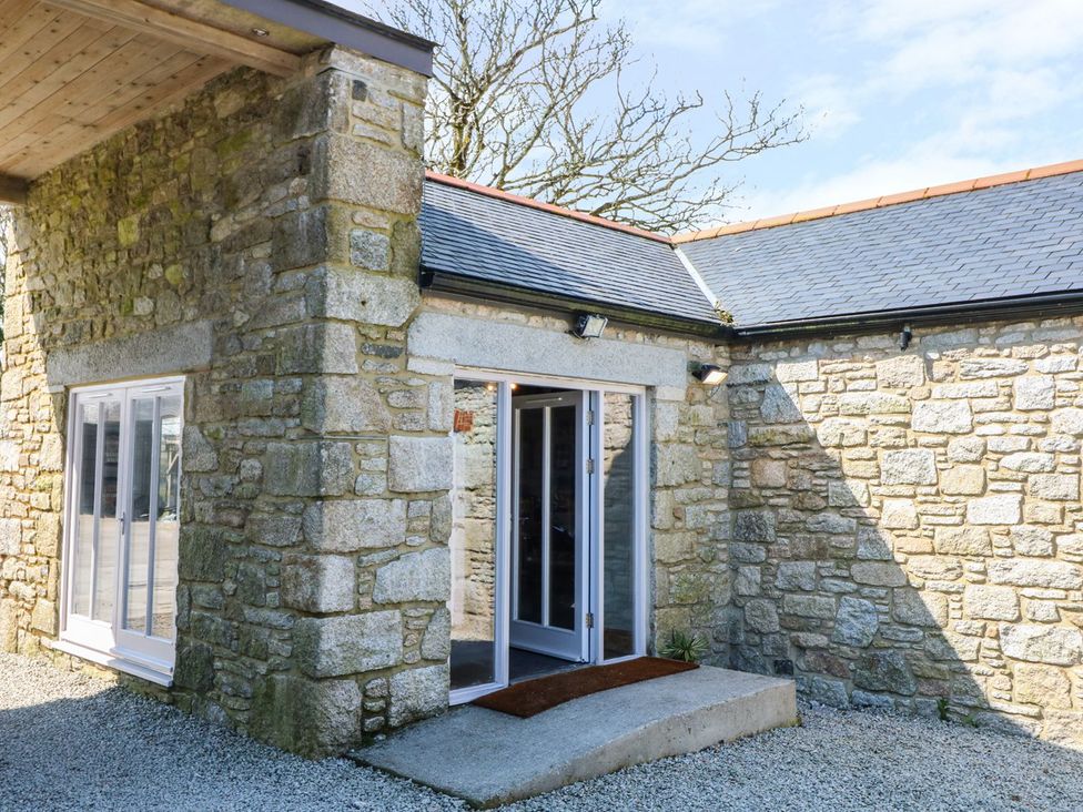 An exterior view of a stone building entrance at Dexter near Constantine
