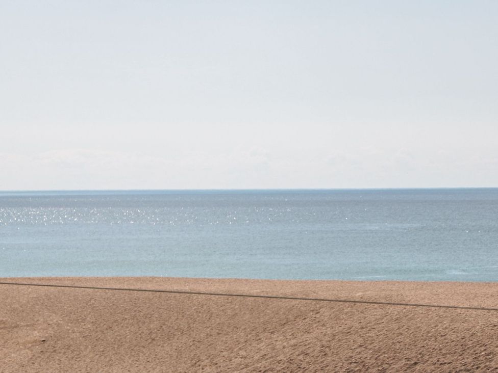 Ocean and sand at Flat 30 in Bridport