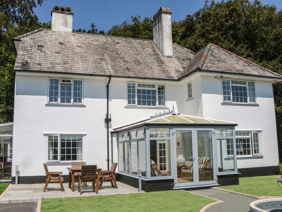 A house with a garden and outdoor seating at The White House Okehampton
