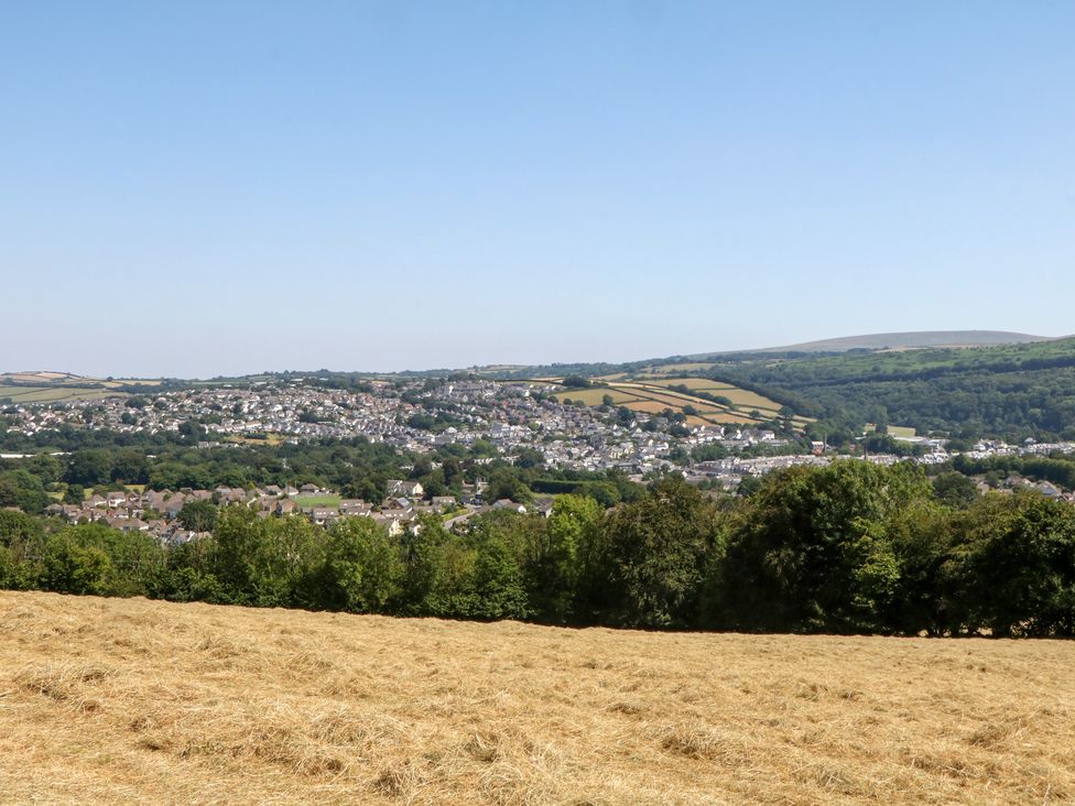 A view of houses and fields in the countryside at The White House in Okehampton