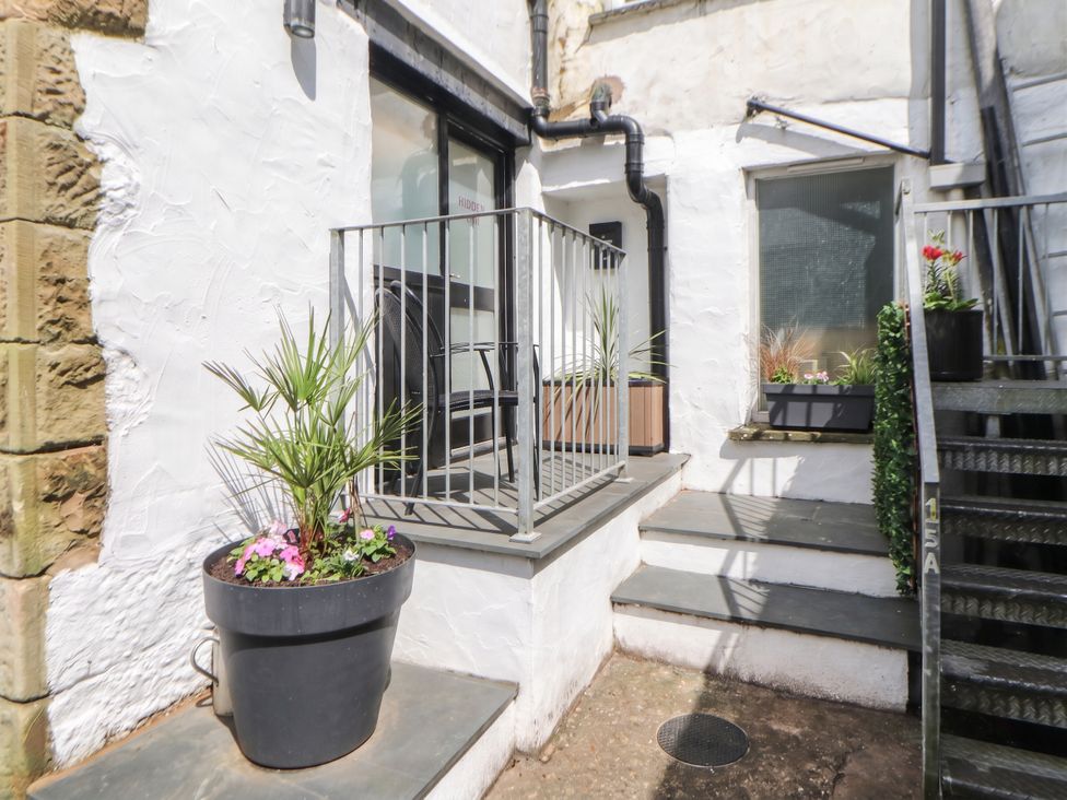 An outdoor area with stairs and plants at Hidden Gem