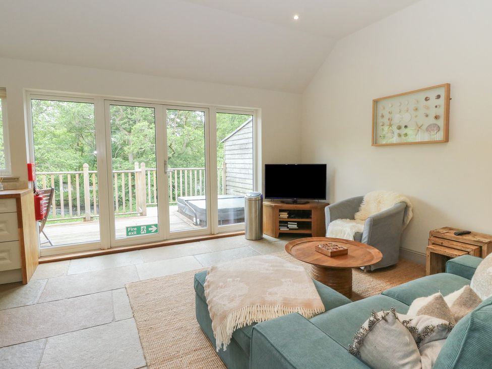 A living room with a sofa and coffee table at Almond in Killin