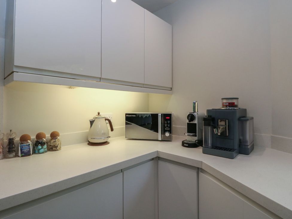 A kitchen corner with appliances at Otter’s Holt in Killin