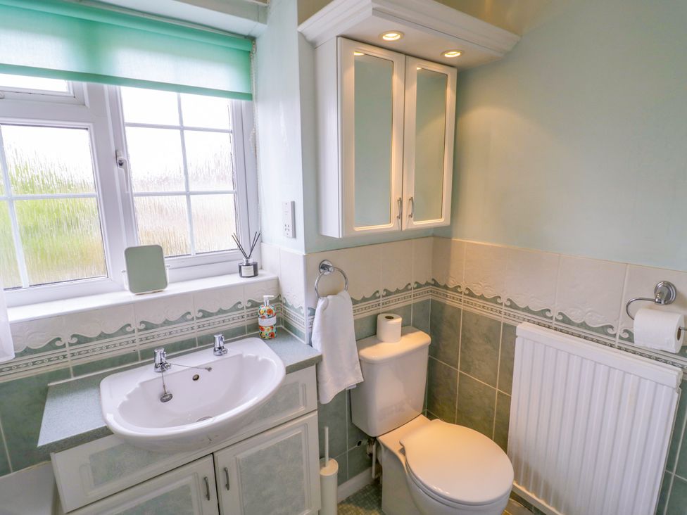 A bathroom with a sink and toilet at Number 10, Broadway