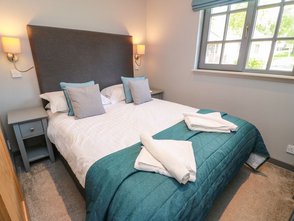 A bedroom with a bed and pillows at 7 Brunston Avenue