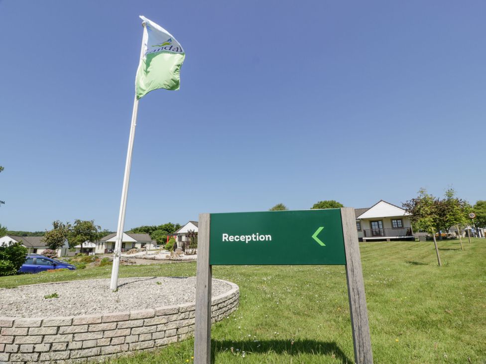 A reception sign directing to the reception area at 7 Brunston Avenue