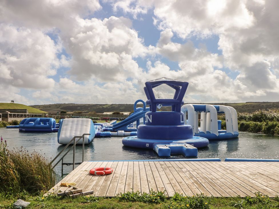 An inflatable water park on a lake at 57 Cliff End in Freshwater