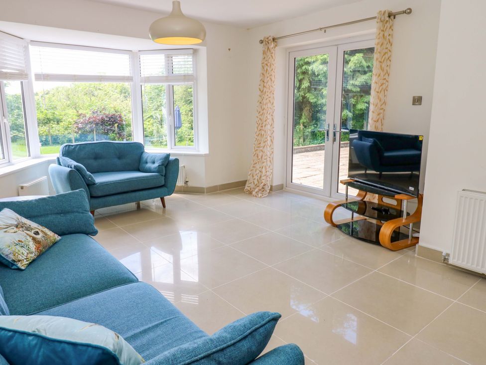 A living room with furniture and a television at 331 Coniscliffe Road Darlington