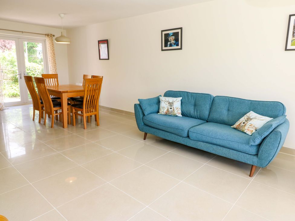 A living room with a dining area and sofa at 331 Coniscliffe Road in Darlington