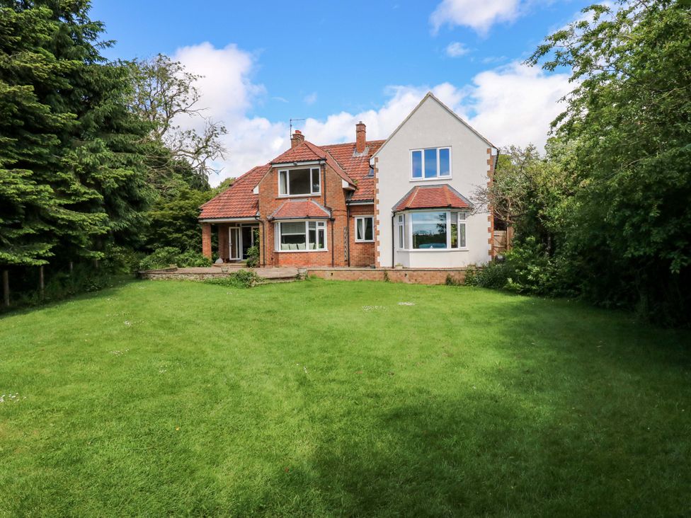 A house with a garden and trees at 331 Coniscliffe Road Darlington