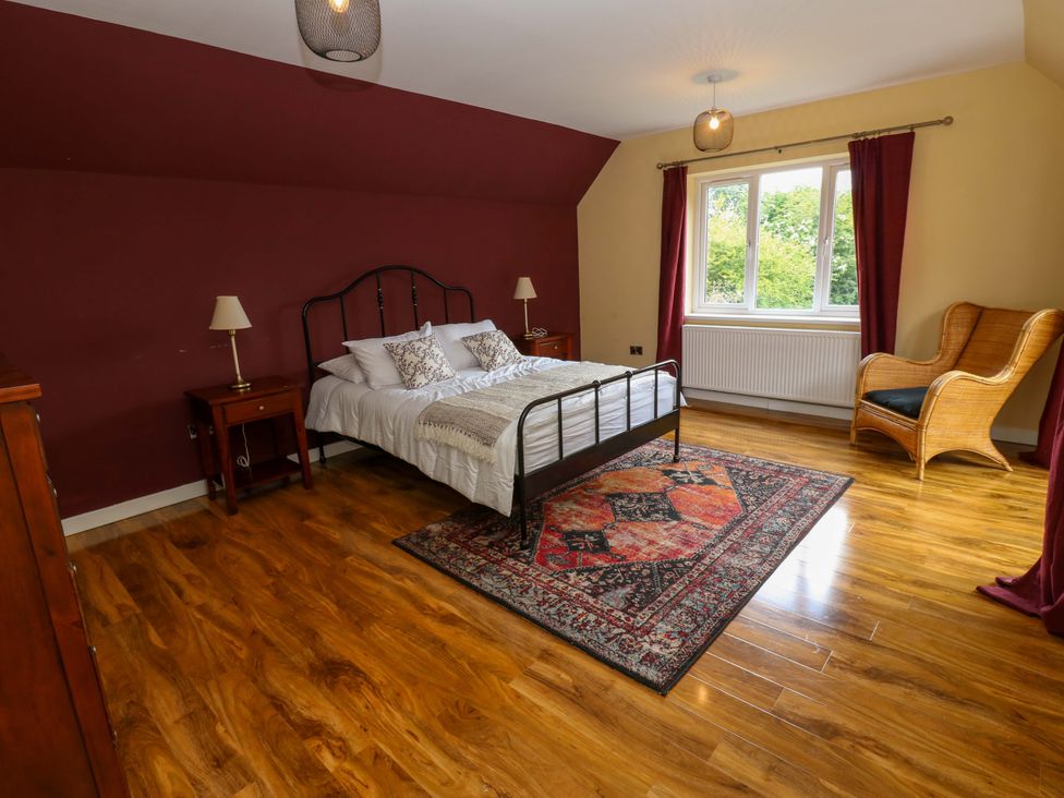 A bedroom with a bed and a nightstand at 331 Coniscliffe Road in Darlington