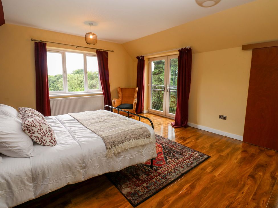 A bedroom with a bed and windows at 331 Coniscliffe Road in Darlington
