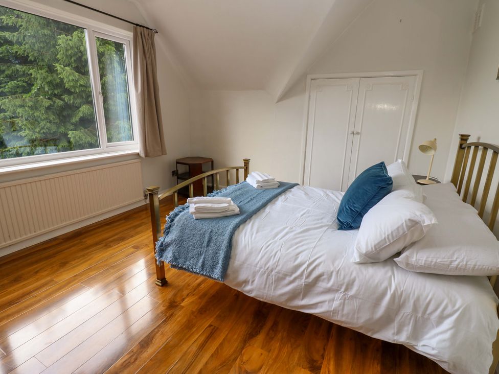 A bedroom with a bed and window at 331 Coniscliffe Road in Darlington
