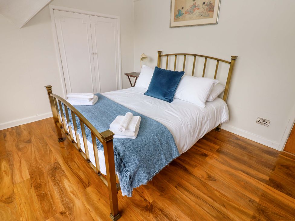 A bedroom with a bed and dresser at 331 Coniscliffe Road in Darlington