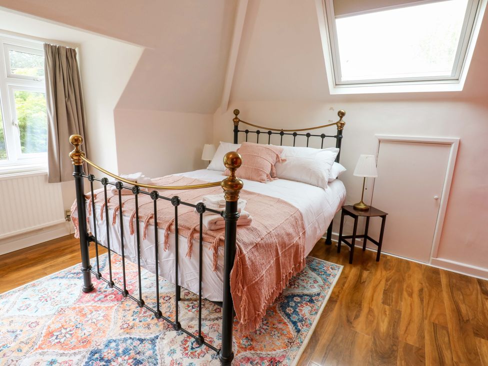 A bedroom with a bed and a bedside table at 331 Coniscliffe Road in Darlington