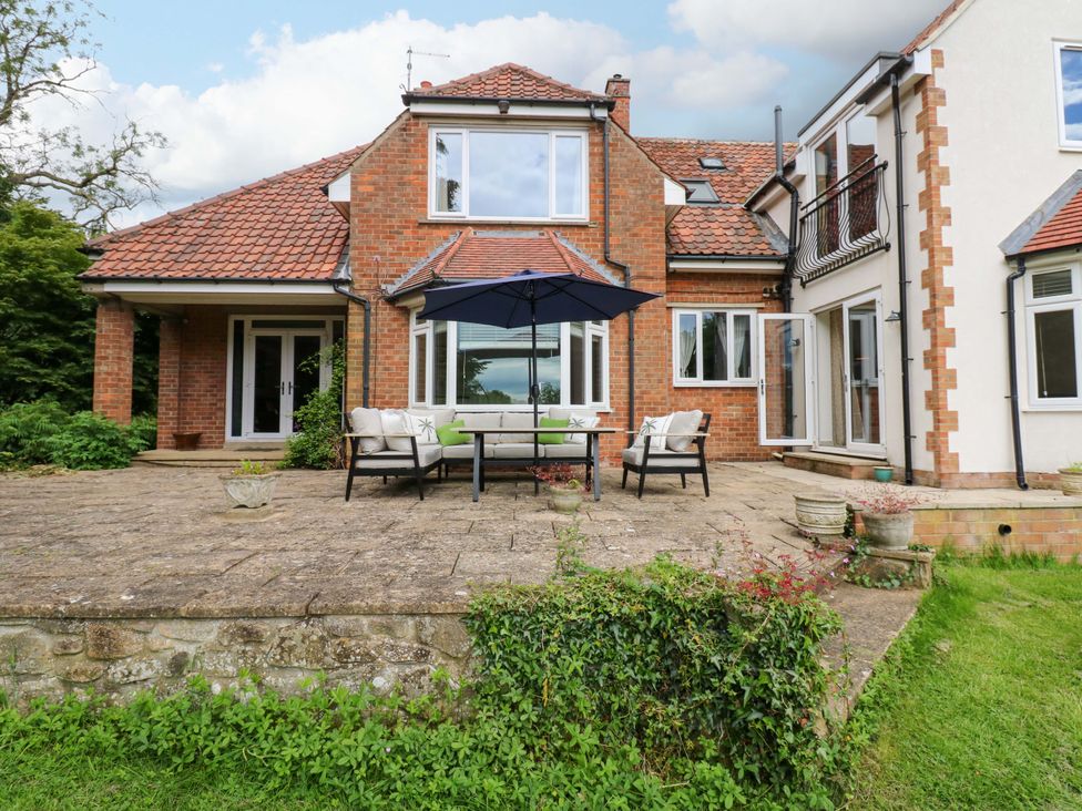 A house with a patio and seating area at 331 Coniscliffe Road Darlington