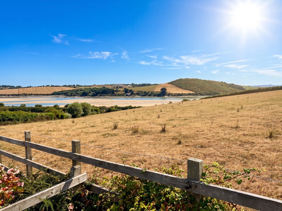 A landscape view of water and hills at Little House in Wadebridge