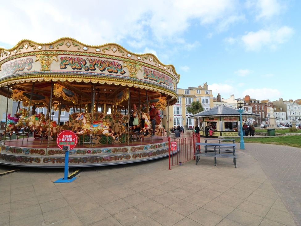 A carousel with horses at Ocean Breeze in Weymouth