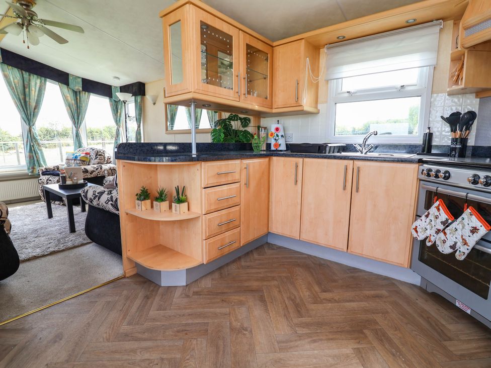 A kitchen with cabinets and countertop at Balwen in Nercwys near Mold