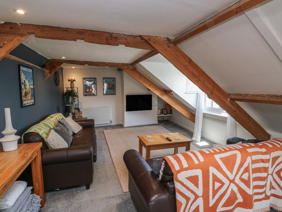 A living room with a sofa and coffee table at 15D Foss Street in Dartmouth