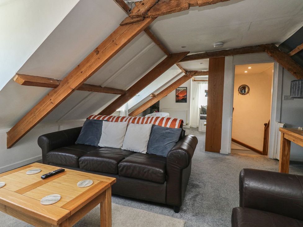 A living room featuring a sofa and coffee table at 15D Foss Street in Dartmouth