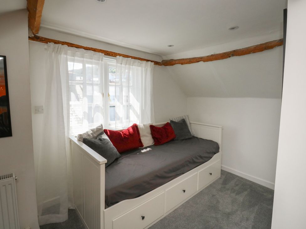 A bedroom with a daybed and pillows at 15D Foss Street Dartmouth