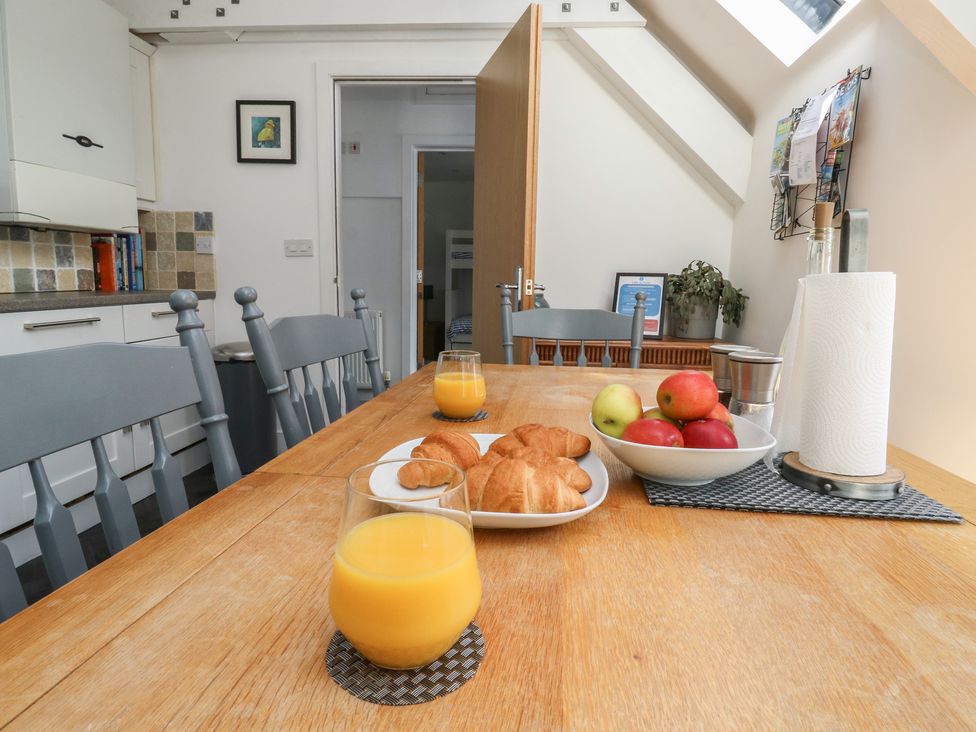 A kitchen with a table set for breakfast at 15D Foss Street Dartmouth