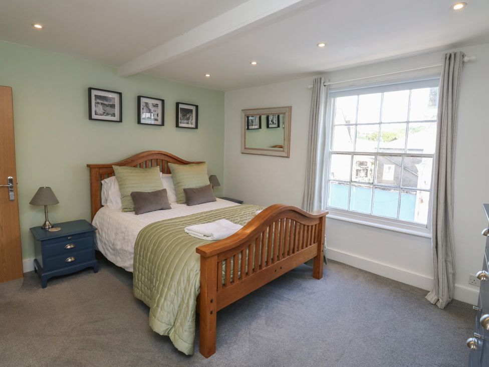 A bedroom with a bed and window at 15D Foss Street Dartmouth