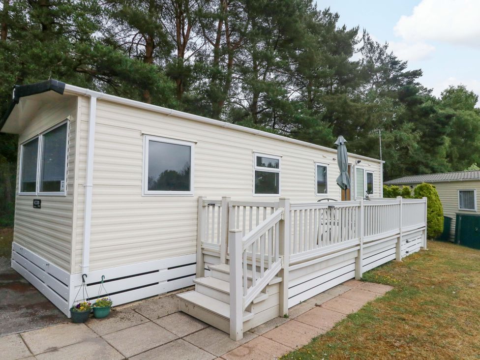 A mobile home with a deck and steps at Foxglove 4 Ringwood