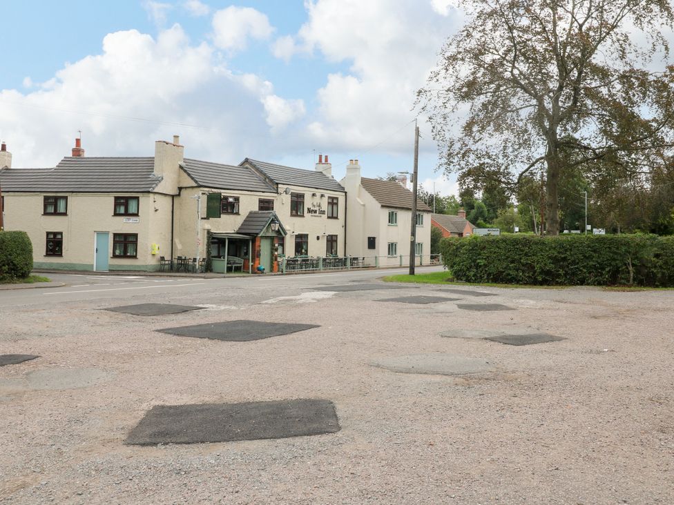 An exterior view of a pub and surrounding area at Next Door No. 4 in Coalville