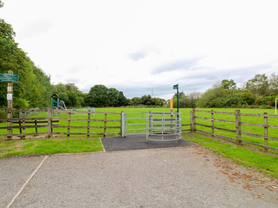 A park entrance with a gate and green space at Next Door No. 4 in Coalville