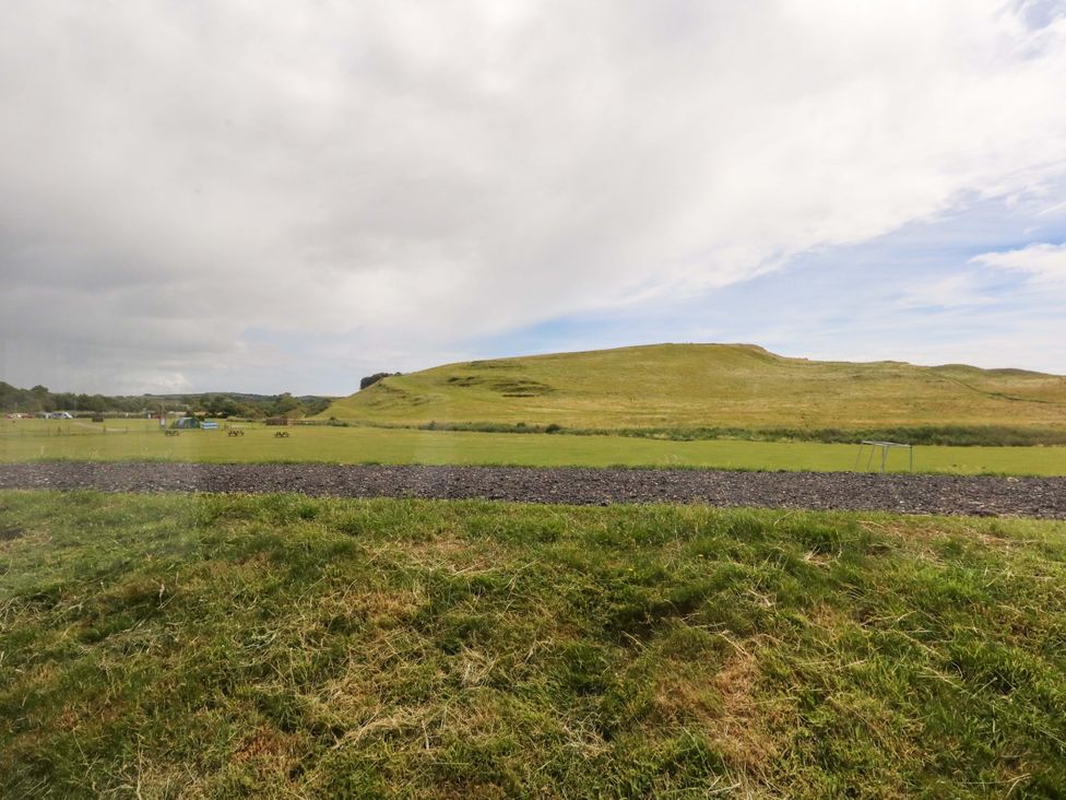 A view of a hill and grassy area at Caravan A7 in Bridport
