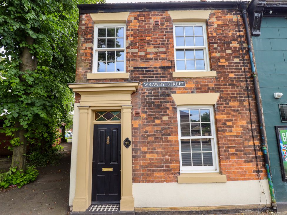 Exterior of a house with a door and windows at 35 Wrawby Street Brigg