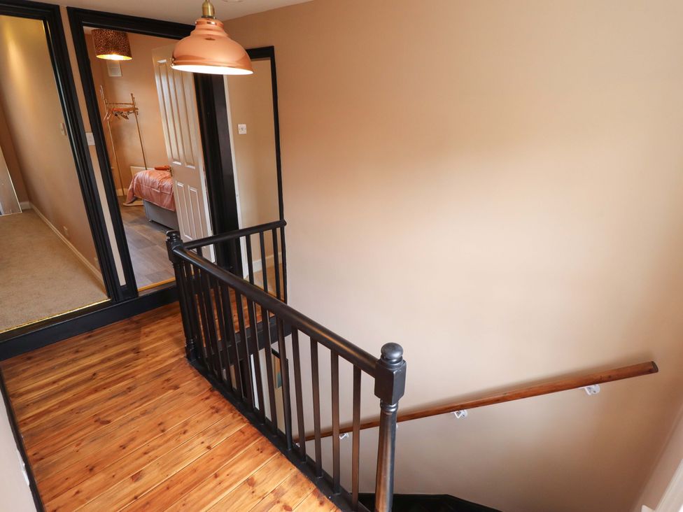 A staircase in a hallway at 35 Wrawby Street in Brigg