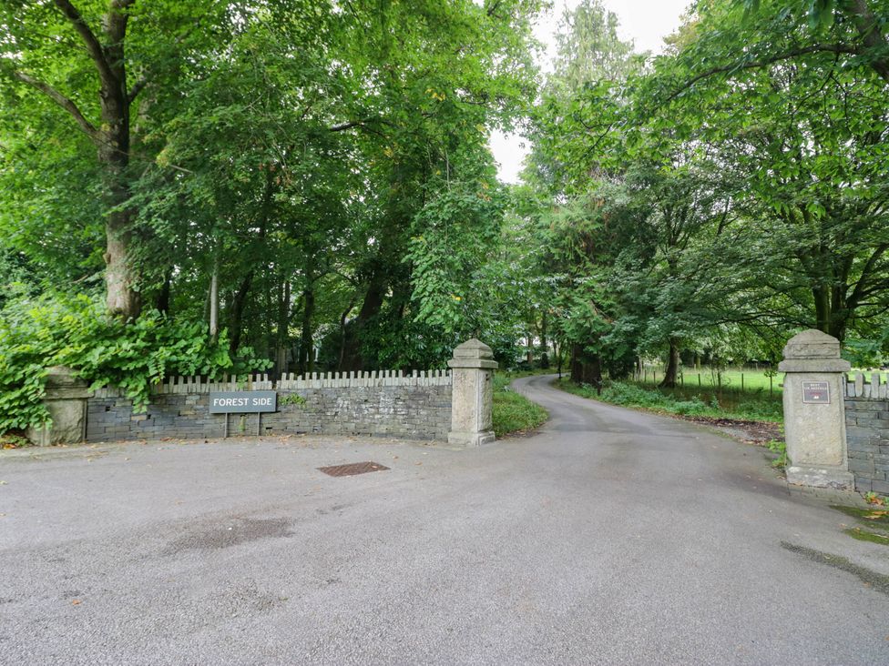 A gateway entrance with a sign labeled 'FOREST SIDE' at Flat 4 Grasmere Lodge Ambleside