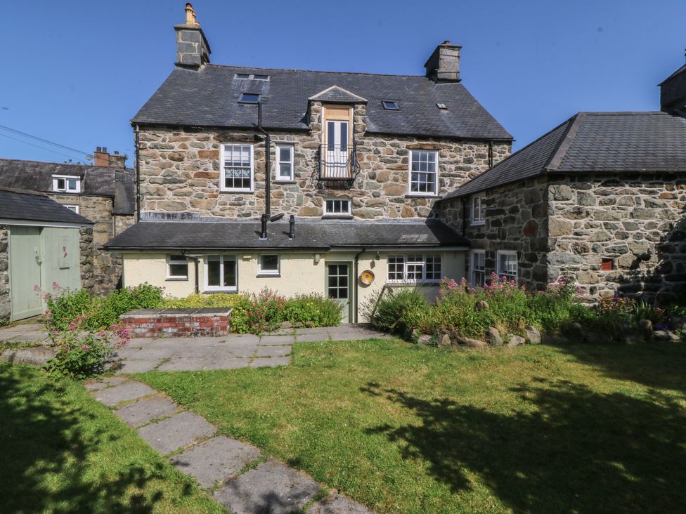 A stone house with a garden at Tan y Gader in Dolgellau