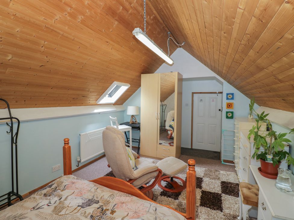 A bedroom with a bed and furniture at Mount Joy in Leicester