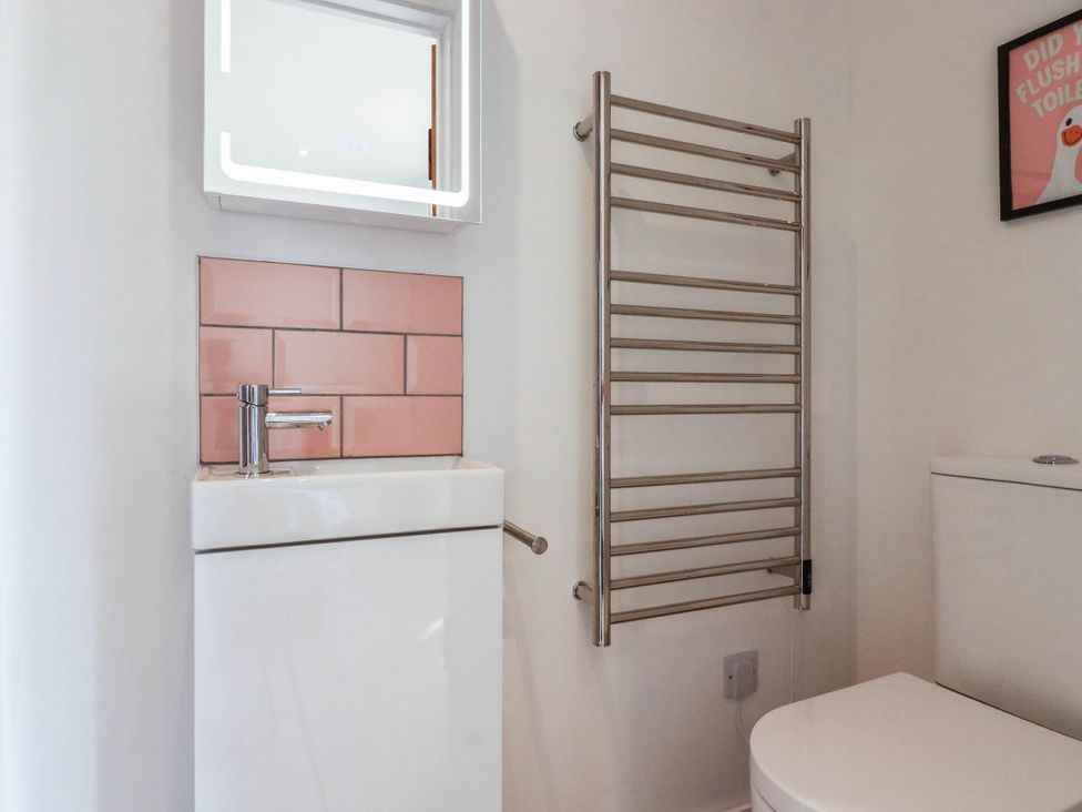 A bathroom with sink and toilet at The Granary in Launceston