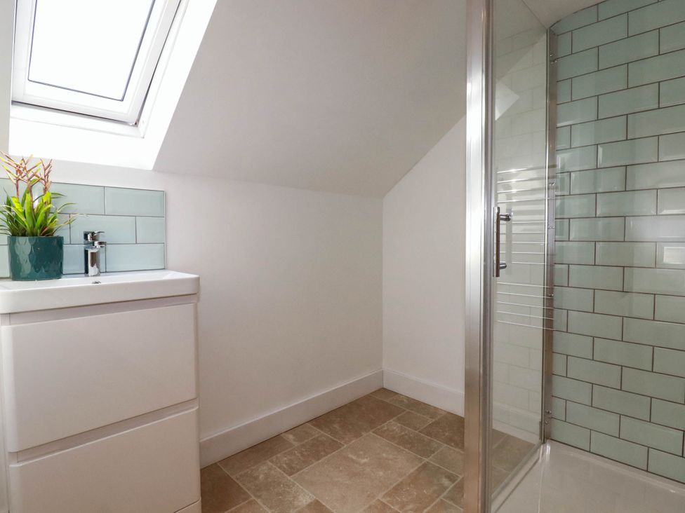 A bathroom with a sink and shower at The Granary in Launceston