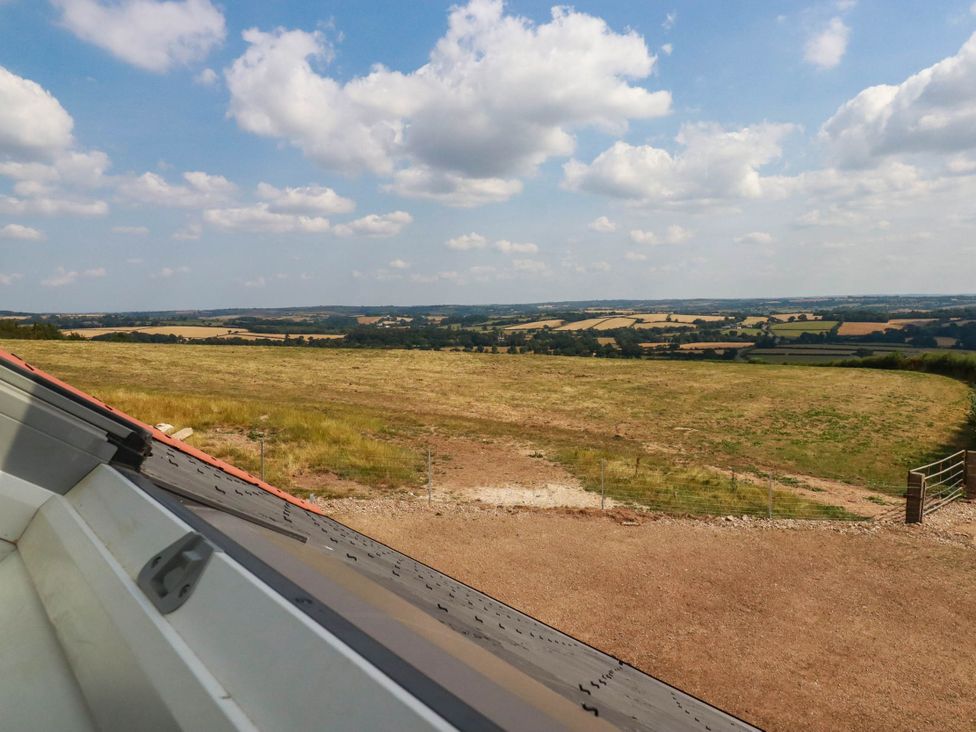 A view of a field and sky from a roof at The Granary in Launceston