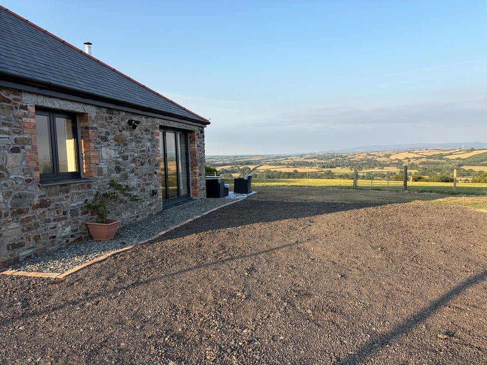 An outdoor area with stone wall and gravel at Up Top in Launceston