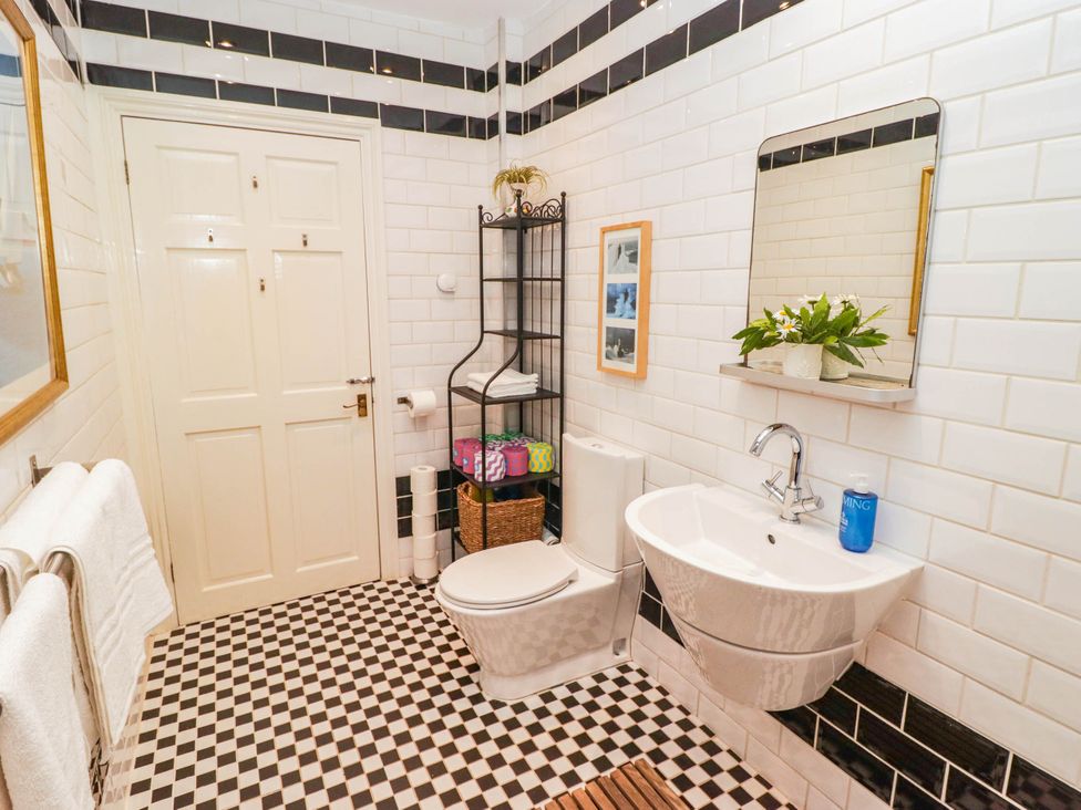 A bathroom featuring a sink and toilet at 11b Market Street Narberth