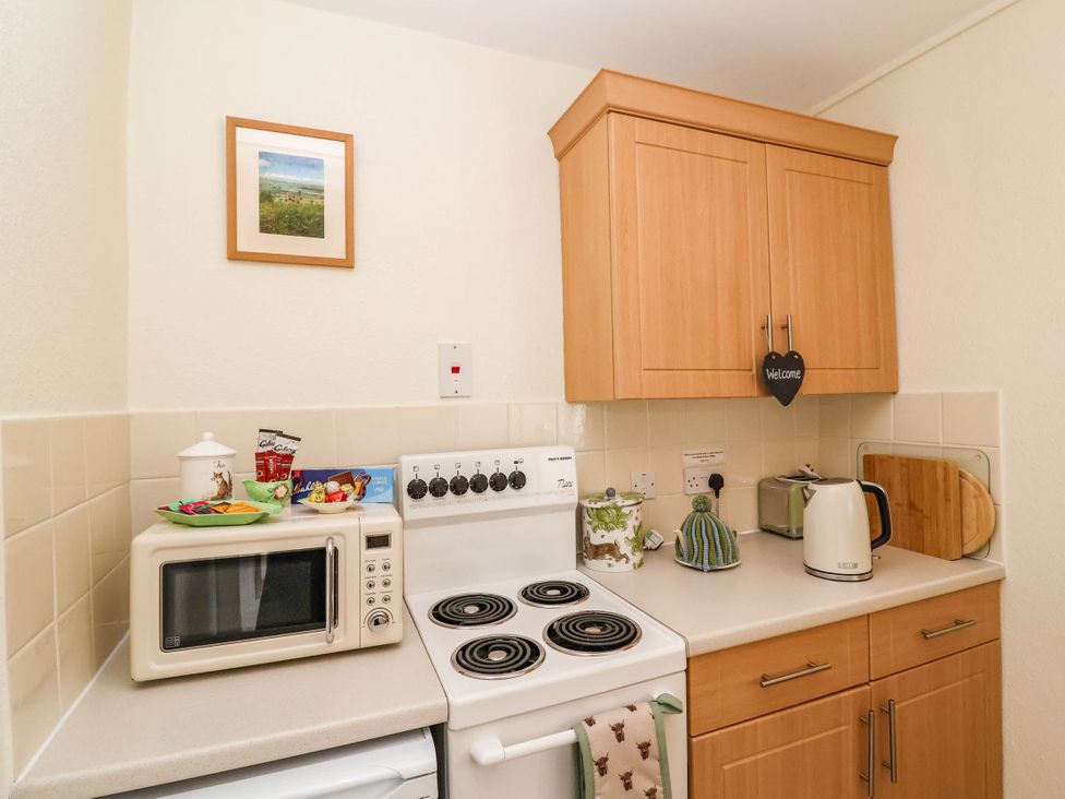 A kitchen with appliances and utensils at 96 Chapel Lane Butleigh